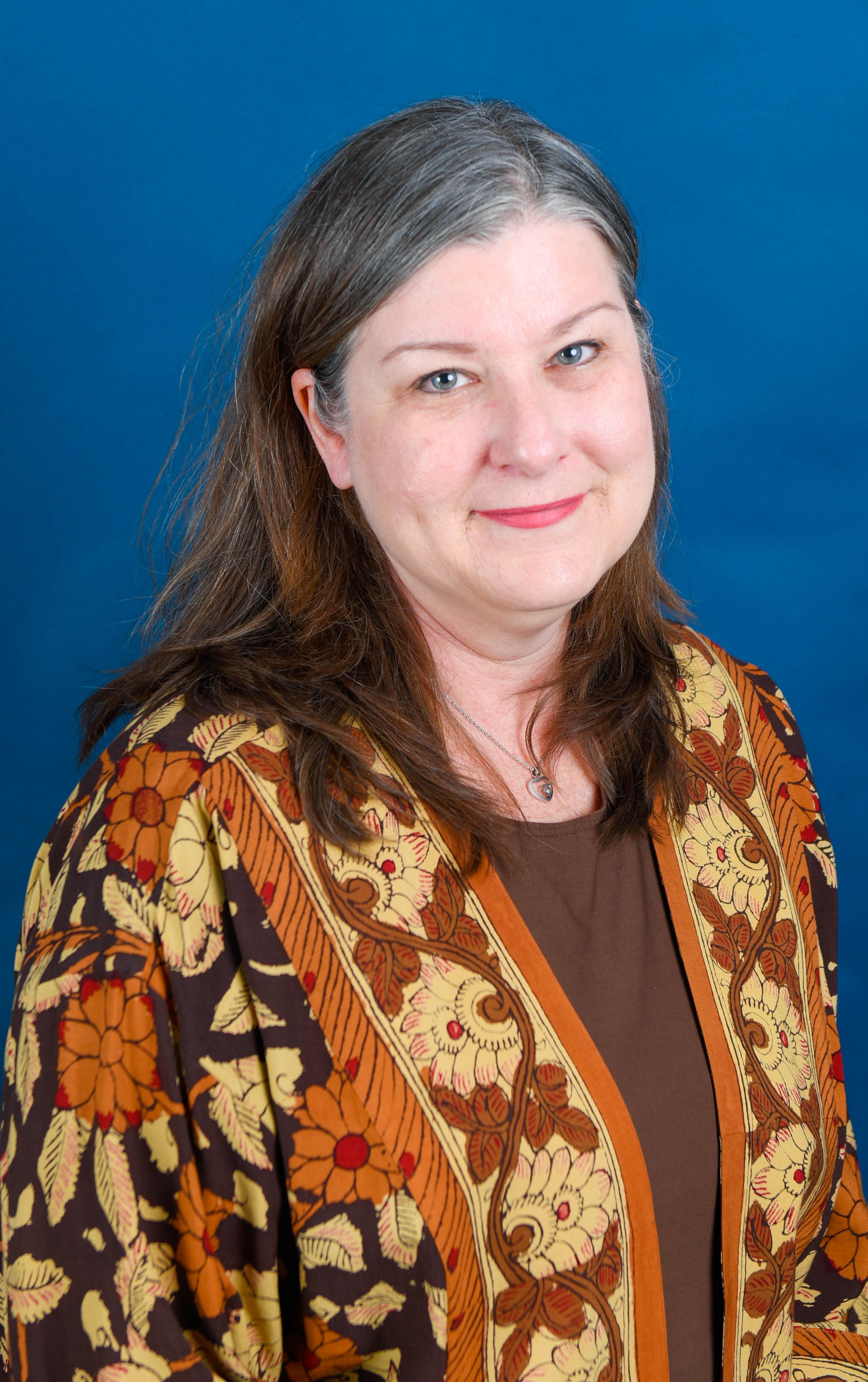 A woman posing for a photo